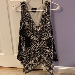 Beautiful black and white sleeveless blouse